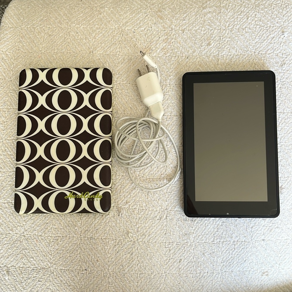 Used kindle fire 1st generation!! Included with case and charger :)